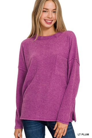 RIBBED BRUSHED MELANGE HACCI SWEATER WITH A POCKET